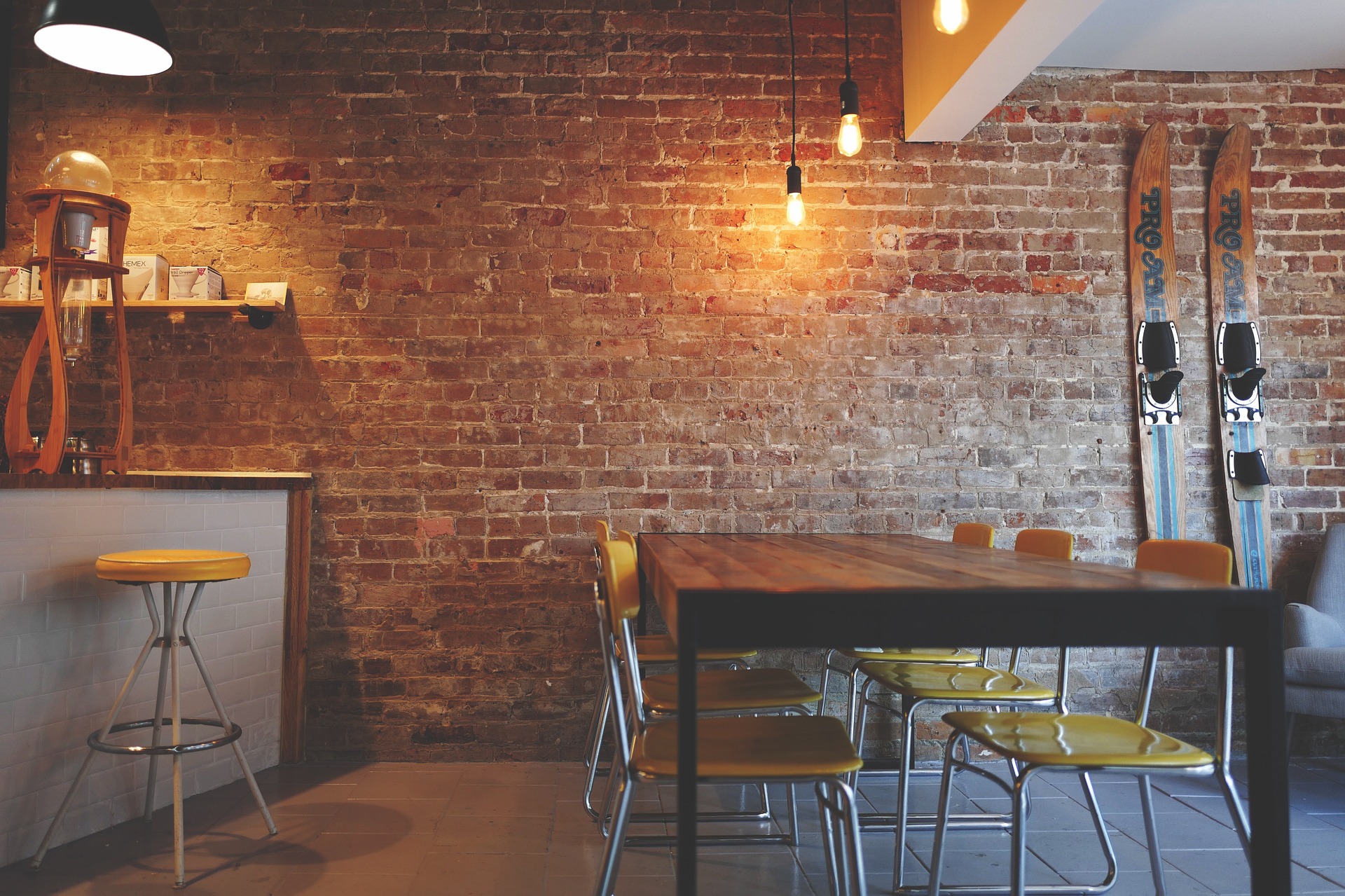 brickwall with restaurant tables