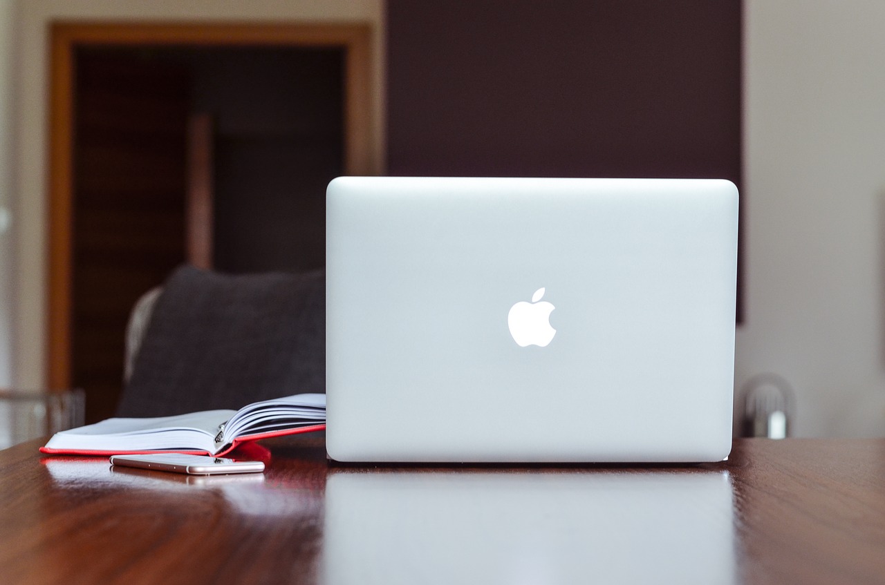 Mac Laptop & on study desk